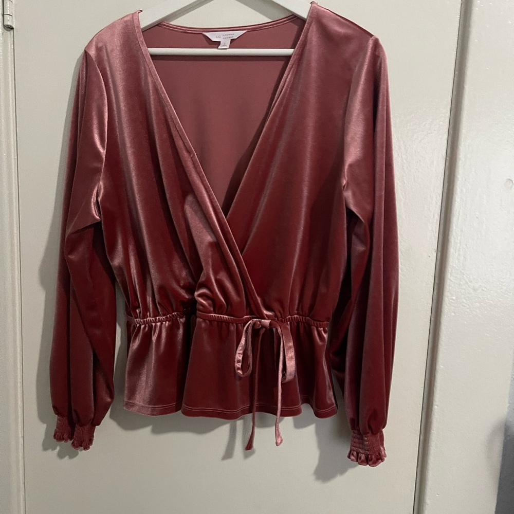 A dark pink blouse from Lauren Conrad